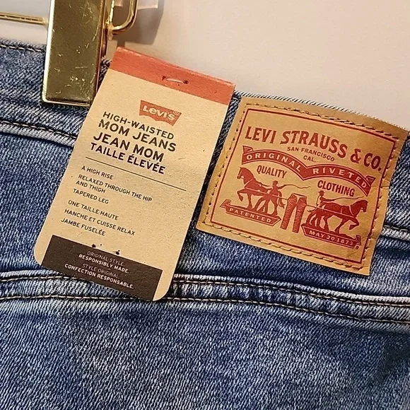 Levis - High Waisted Mom Jeans, Distressed, Blue Denim​​​​​​ - Picture 7 of 14